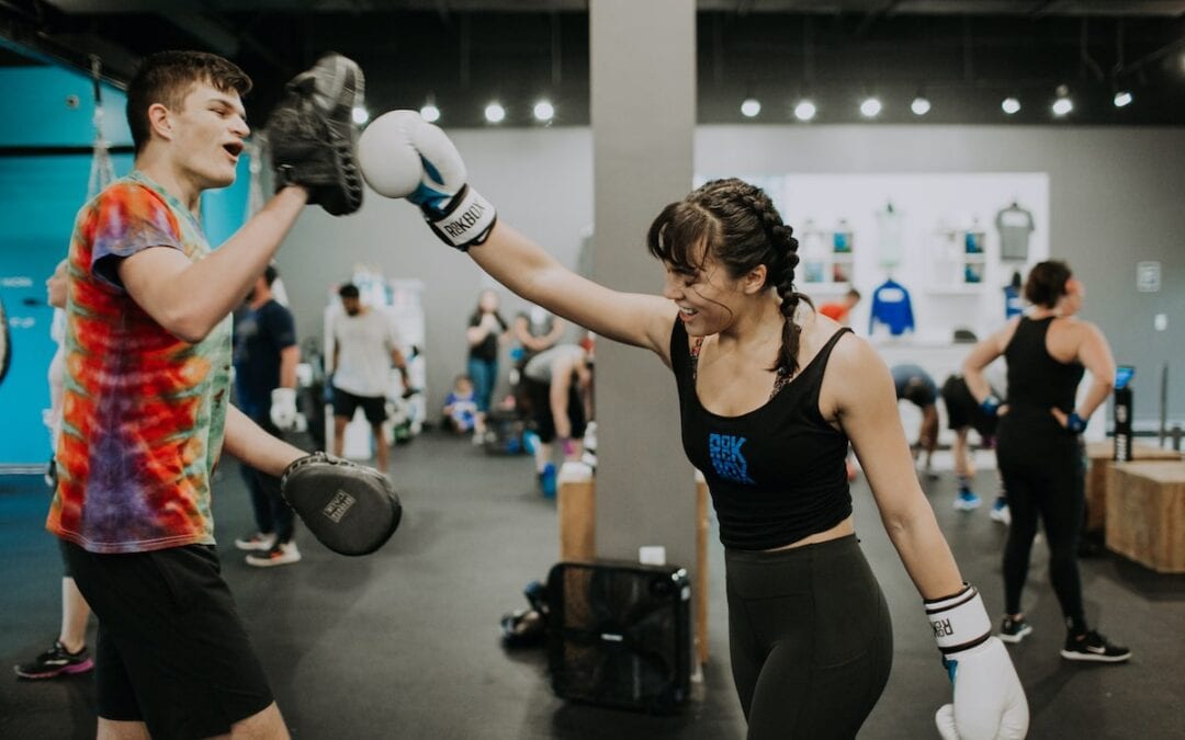 woman punching mitts